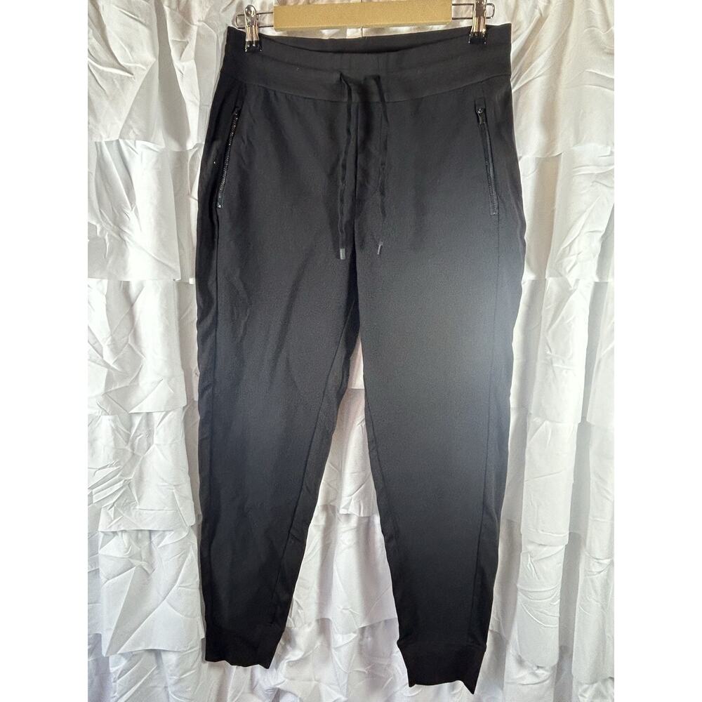 Athleta Jogger Pants Womens size 8 Black Stretch Zip Pockets drawstring black